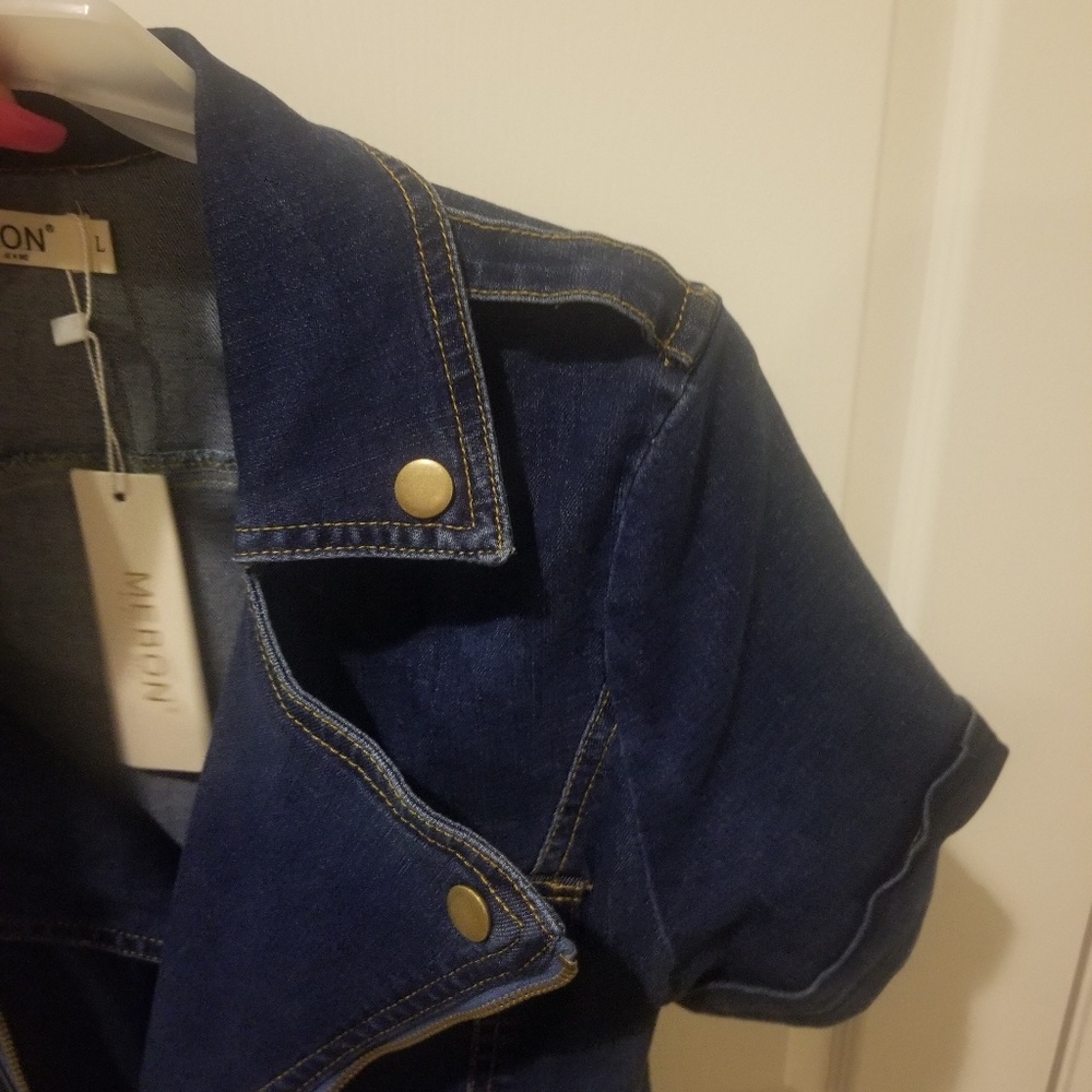 Denim jumpsuit with denim belt.